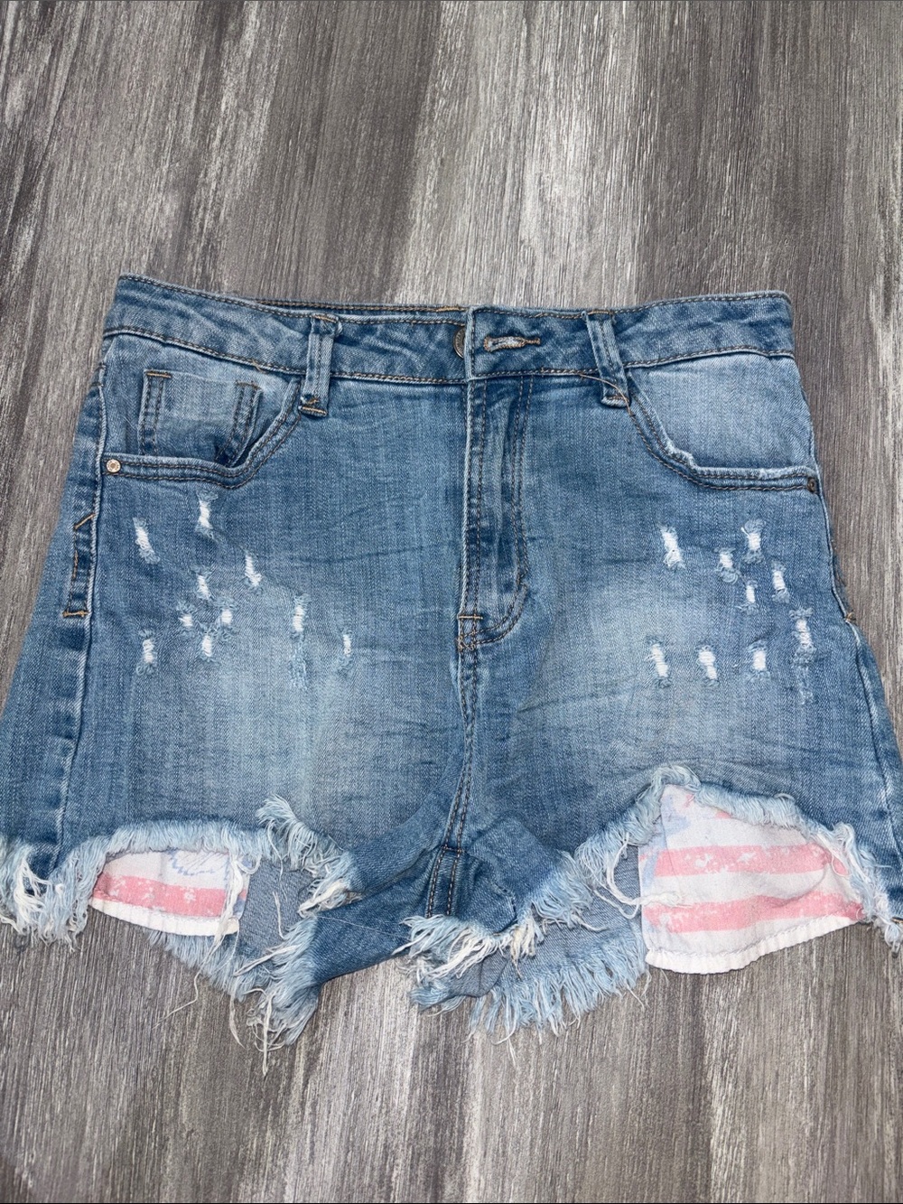 Papaya Distressed Denim Shorts in Blue with Striped Pocket Trim